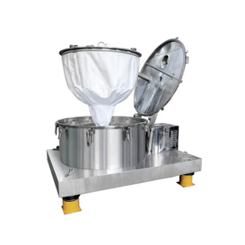 Centrifugeuse à décharge supérieure